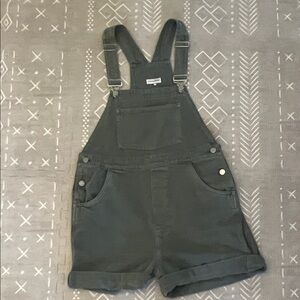 We Wore What green denim shortalls
